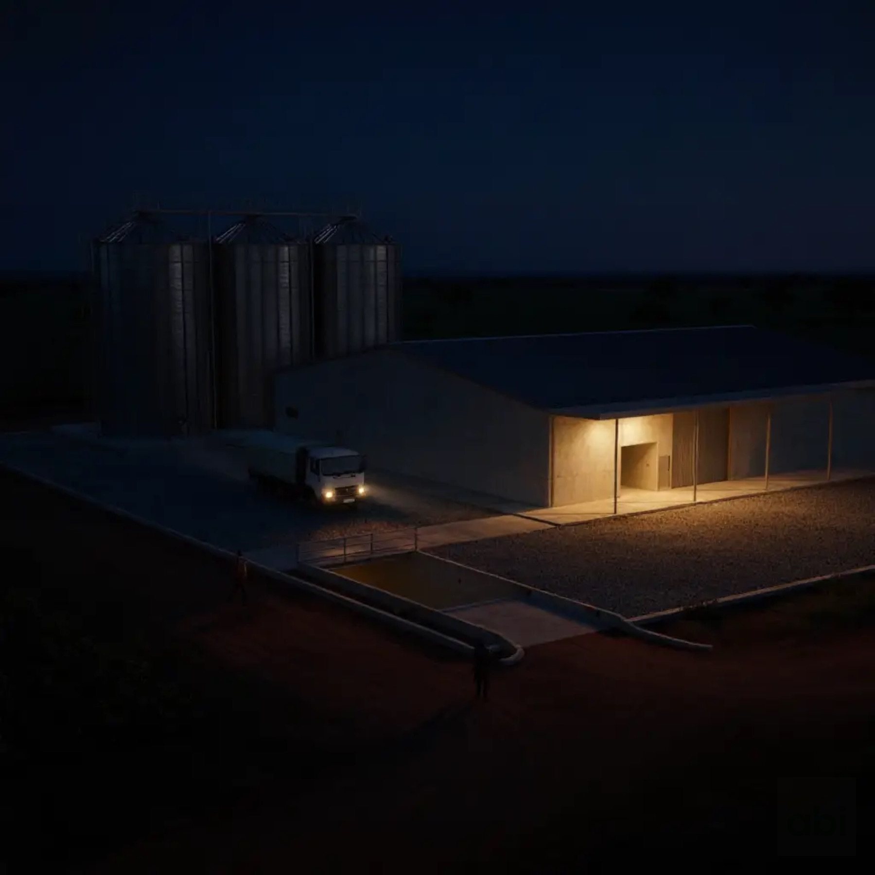 The facility at dusk with the last lorry leaving